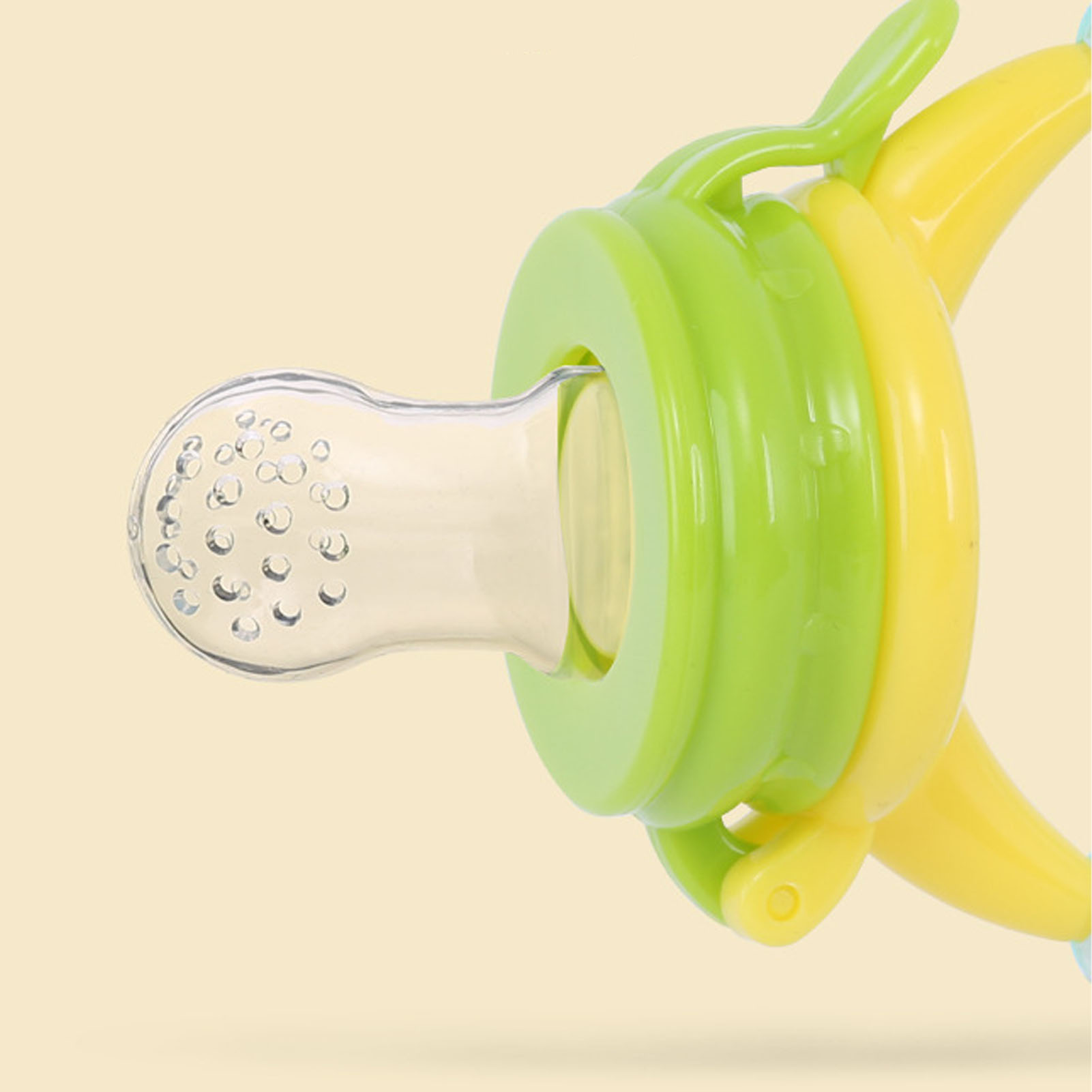 Alimentatore per bambini in silicone testurizzato con dentiera a sonaglio per imparare a masticare - Foto 33 di 63